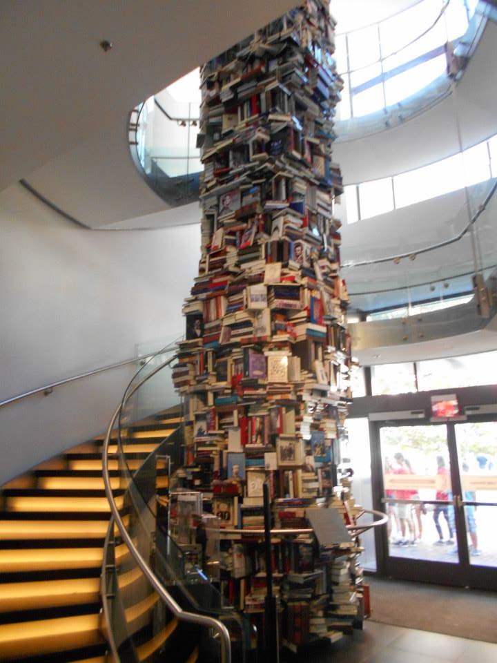 Two story tall stack of books. 