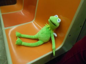 Kermit riding the subway