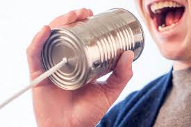 speaking into tin can telephone