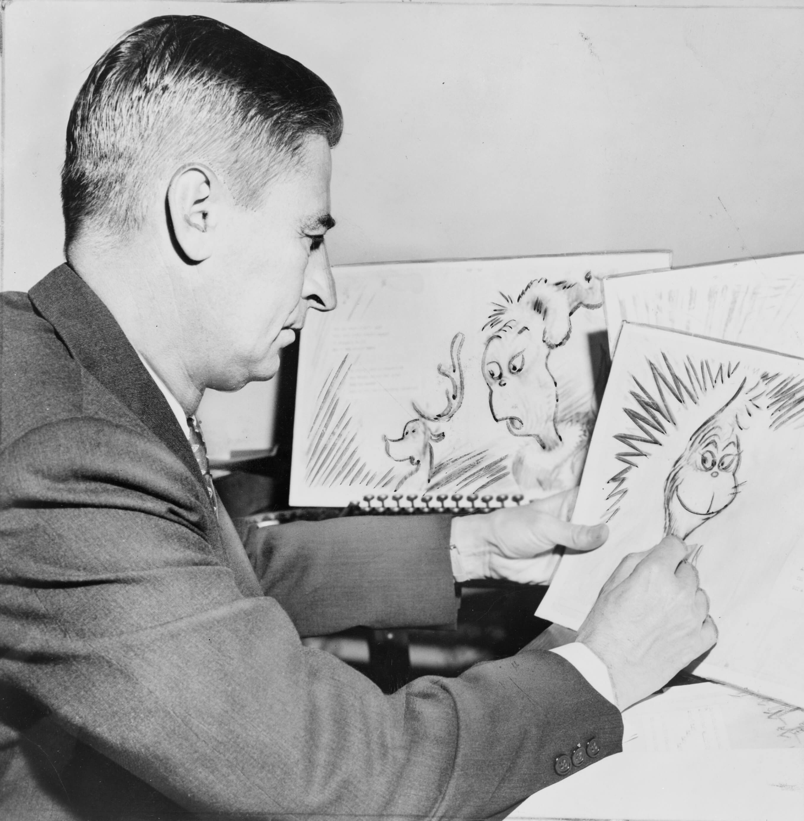 Dr. Seuss with Grinch drawing